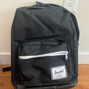 Herschel black backpack, red & white striped interior